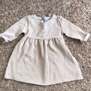 Girls tan dress with shimmery socks of gold